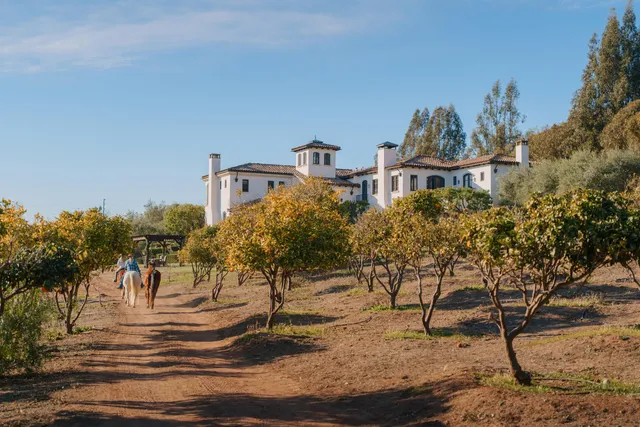 a view of water heater room with stairs