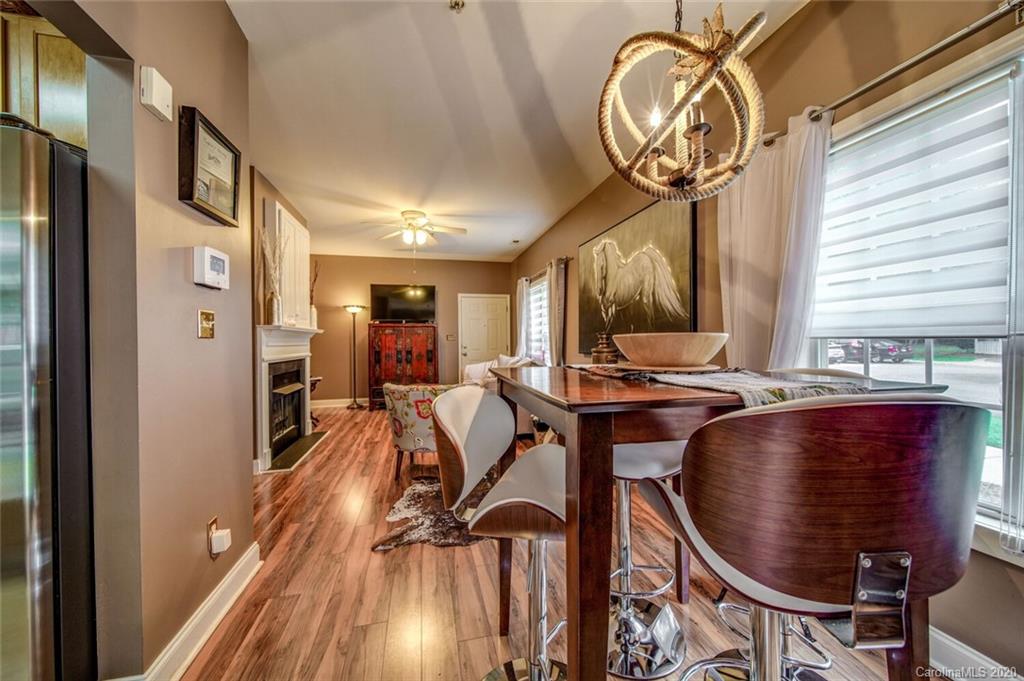 917 Shearer Street, Unit 7 Davidson, NC 28036 - Photo 3 of 31 a view of a room with gym equipment