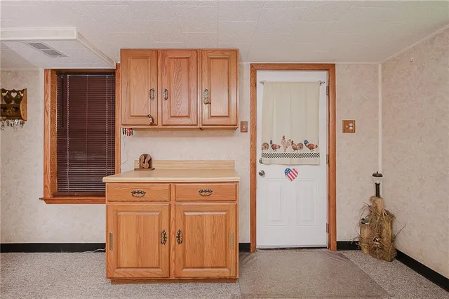 a view of cabinets with wooden floor