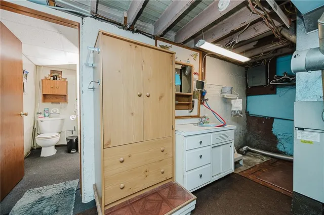 a view of storage and utility room