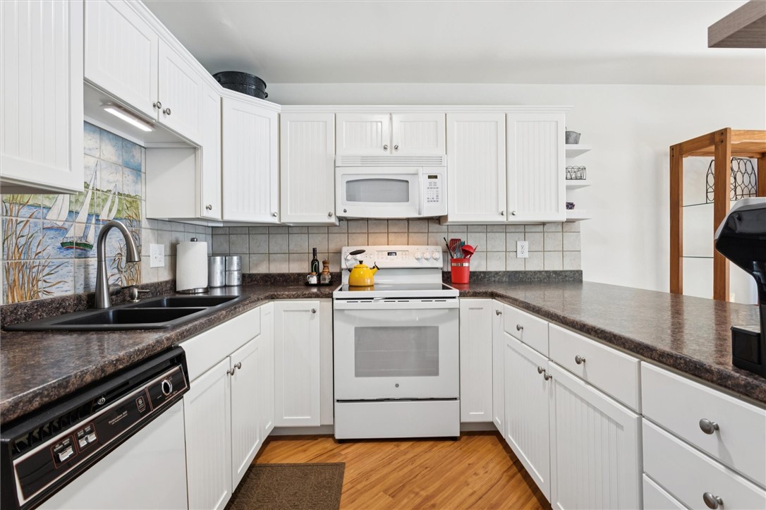 97 Villa Ridge Drive, Unit 2F Hartfield, VA 23071 - Photo 16 of 50 This dishwasher actually cleans your dishes!