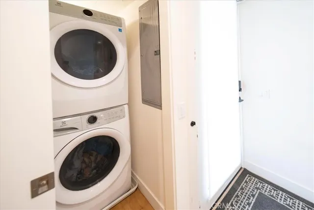 a bedroom with a bed and a lamp