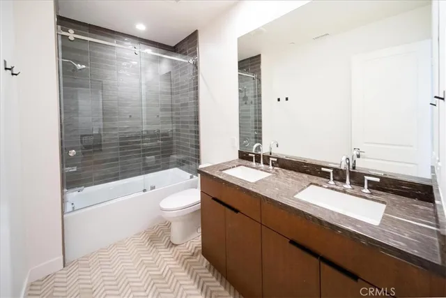 a bedroom with a bed and furniture