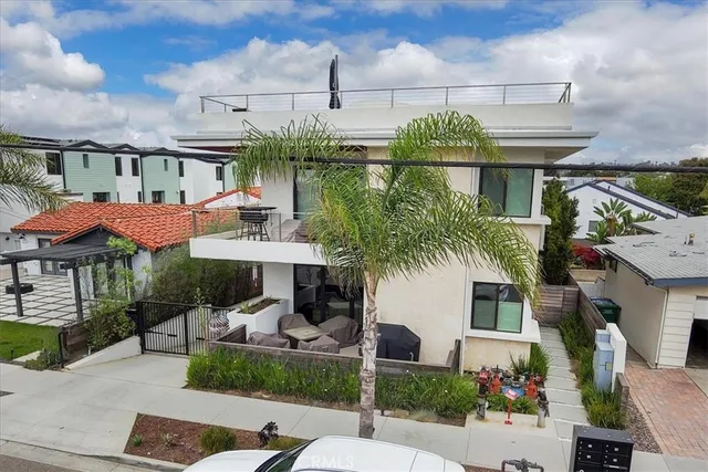 an aerial view of a building with garden
