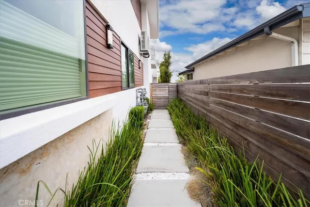 a narrow alley leading to a building