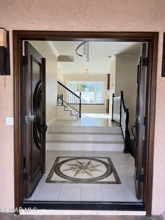 a view of a entryway door of the house