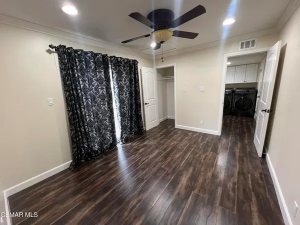 a view of a bathroom from a hallway