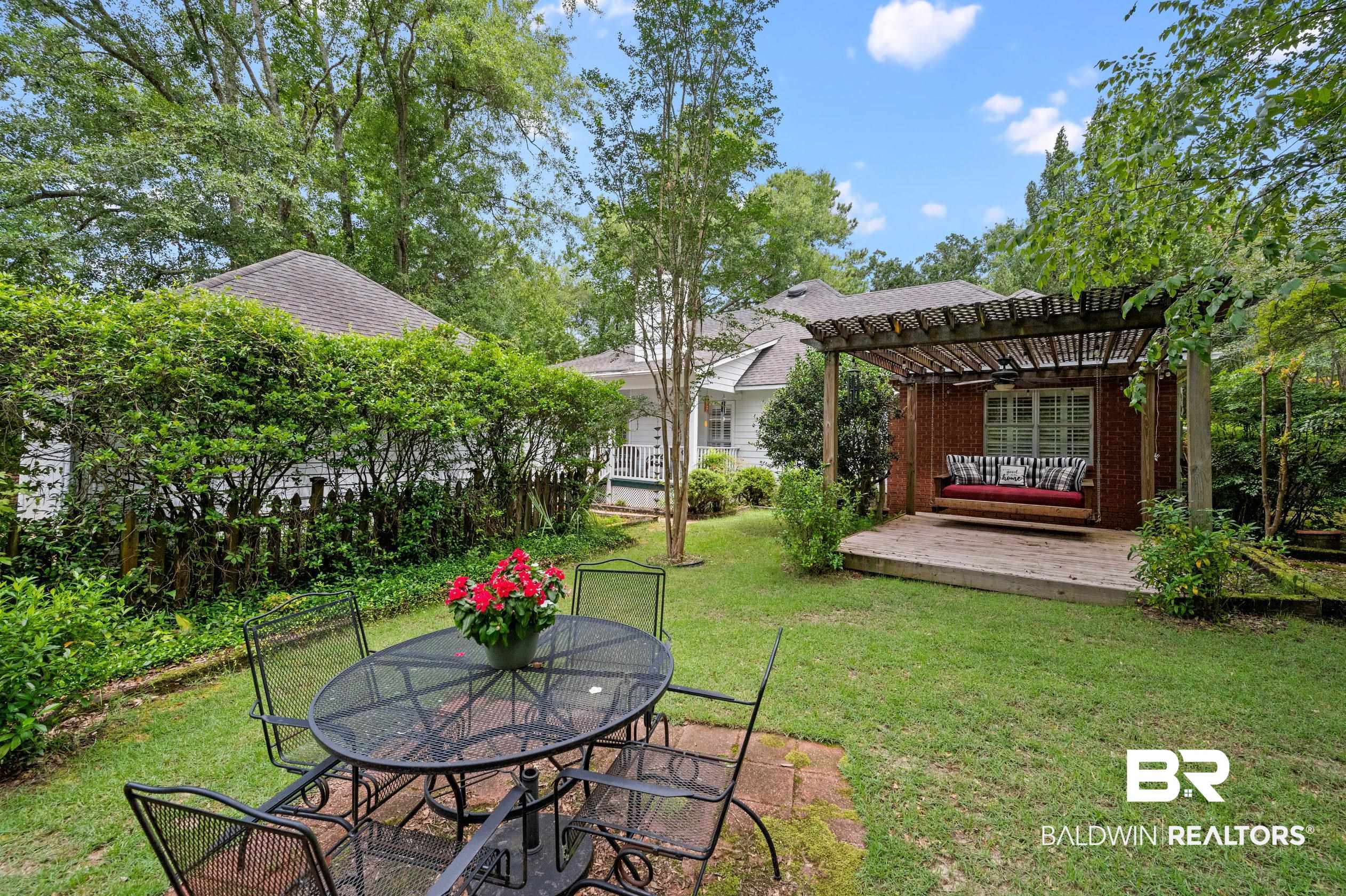 6638 Jackson Square Daphne, AL 36526 - Photo 2 of 62 View of yard with a pergola