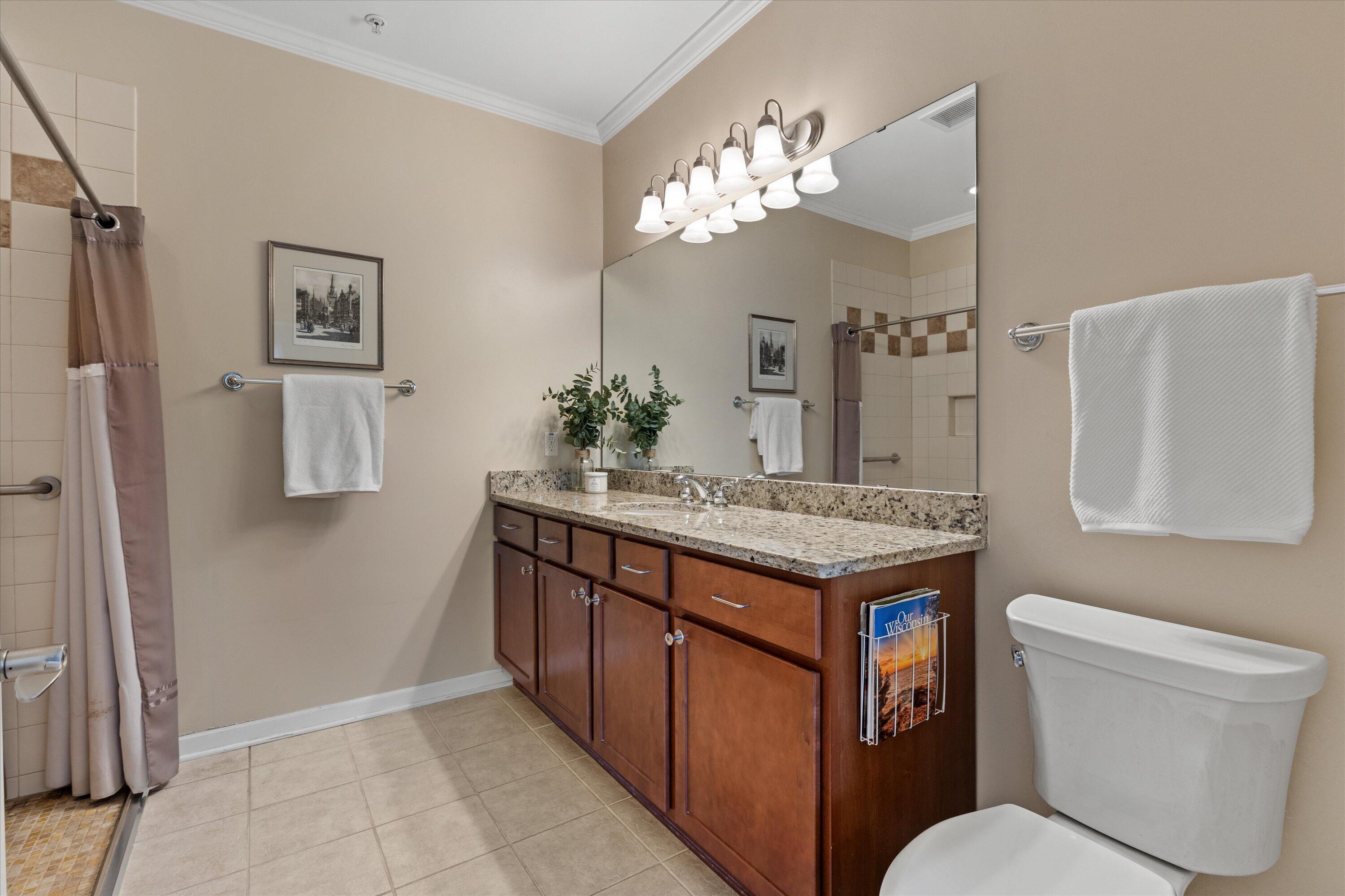 4 Gas Light Drive, Unit 111 Racine, WI 53403 - Photo 18 of 31 Primary Suite Bathroom
