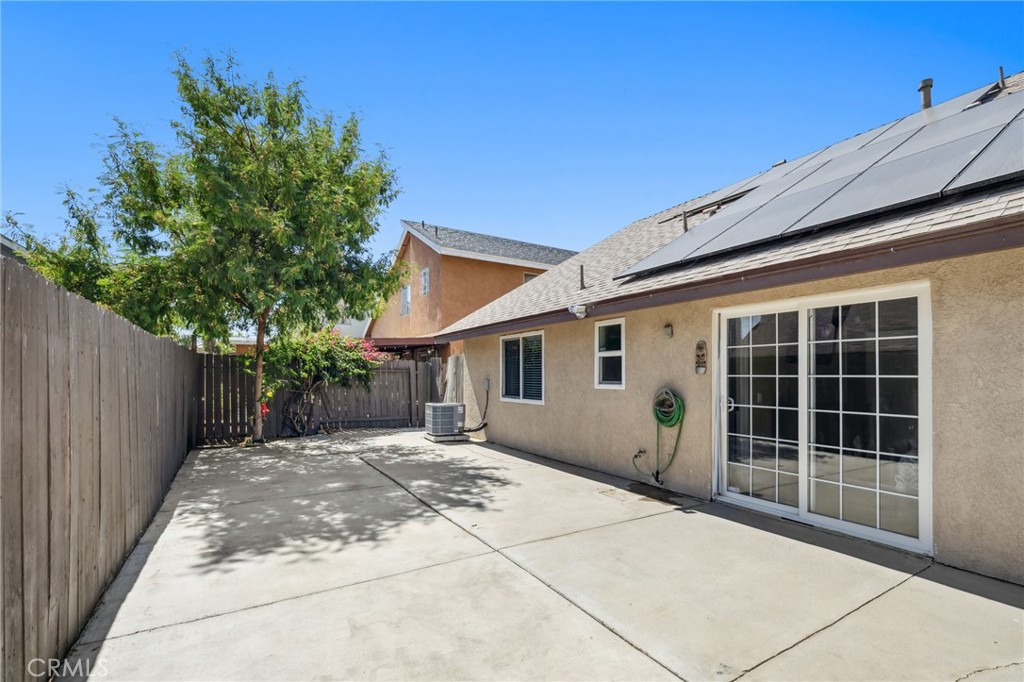 129 Avocado Avenue Perris, CA 92571 - Photo 21 of 30 a front view of a house with a garden