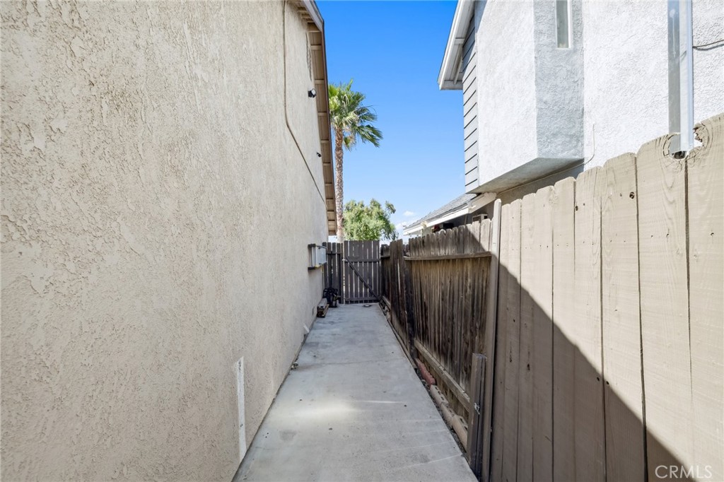 129 Avocado Avenue Perris, CA 92571 - Photo 22 of 30 a view of balcony with wooden floor