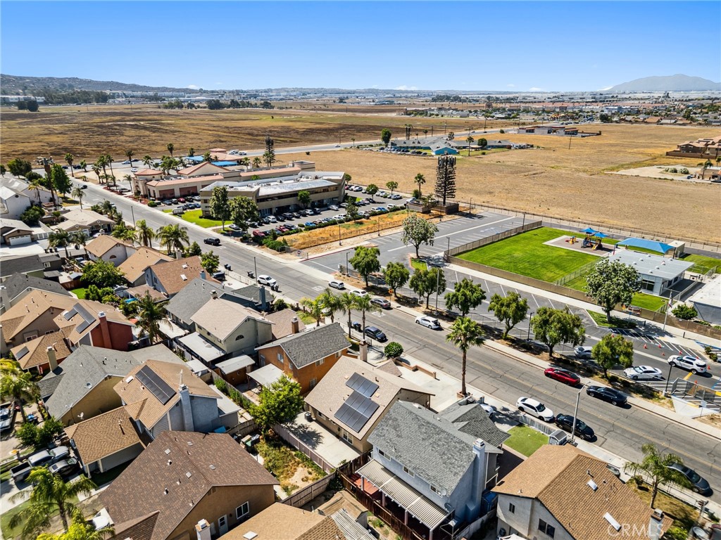 129 Avocado Avenue Perris, CA 92571 - Photo 25 of 30 an aerial view of ocean and residential houses with outdoor space