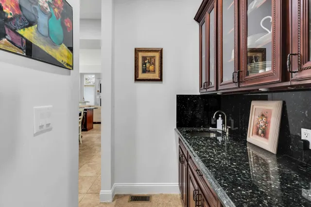 a kitchen with stainless steel appliances granite countertop a stove and a microwave