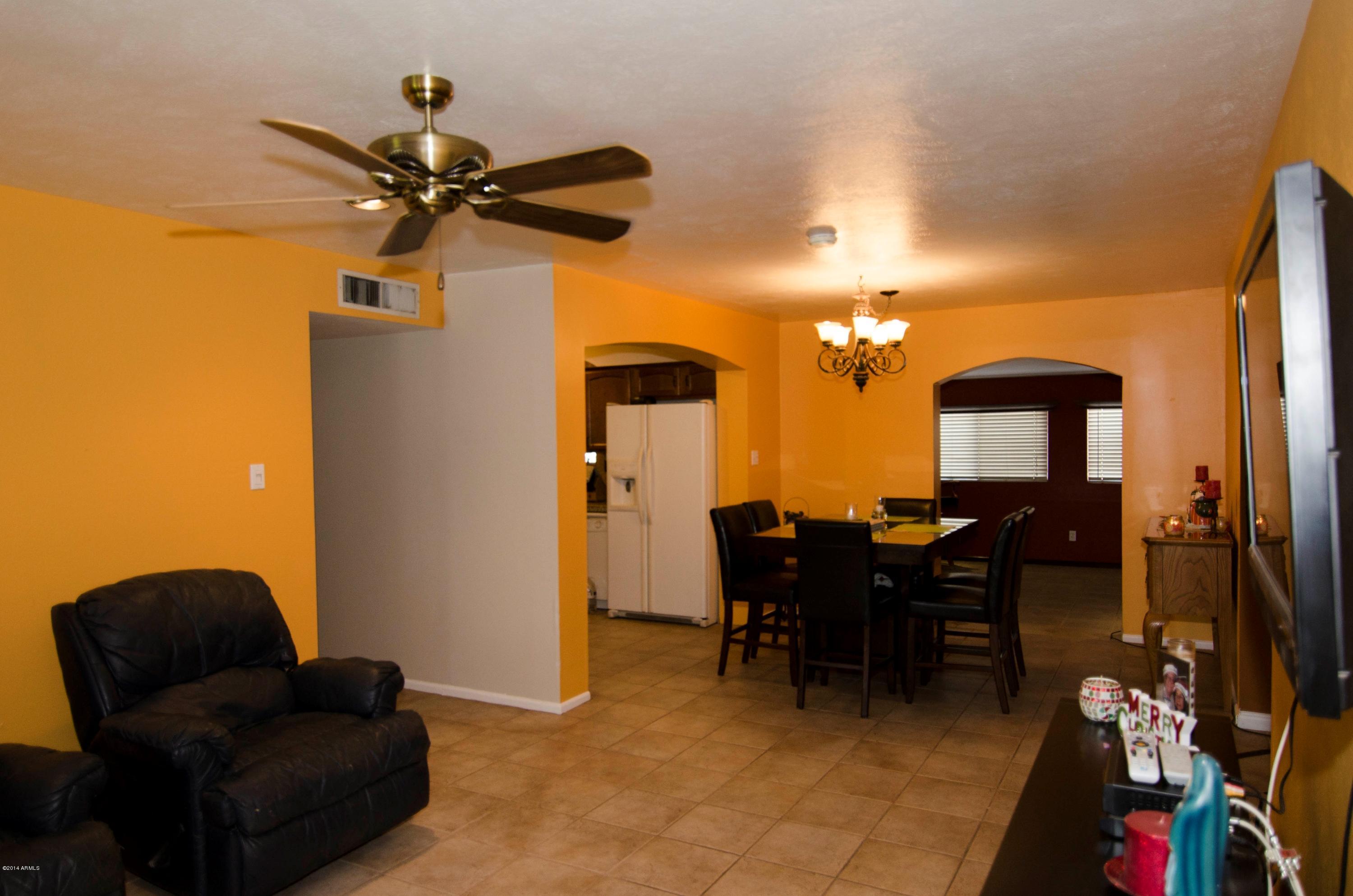 3916 West Griswold Road Phoenix, AZ 85051 - Photo 4 of 24 Great Room-Dining Area