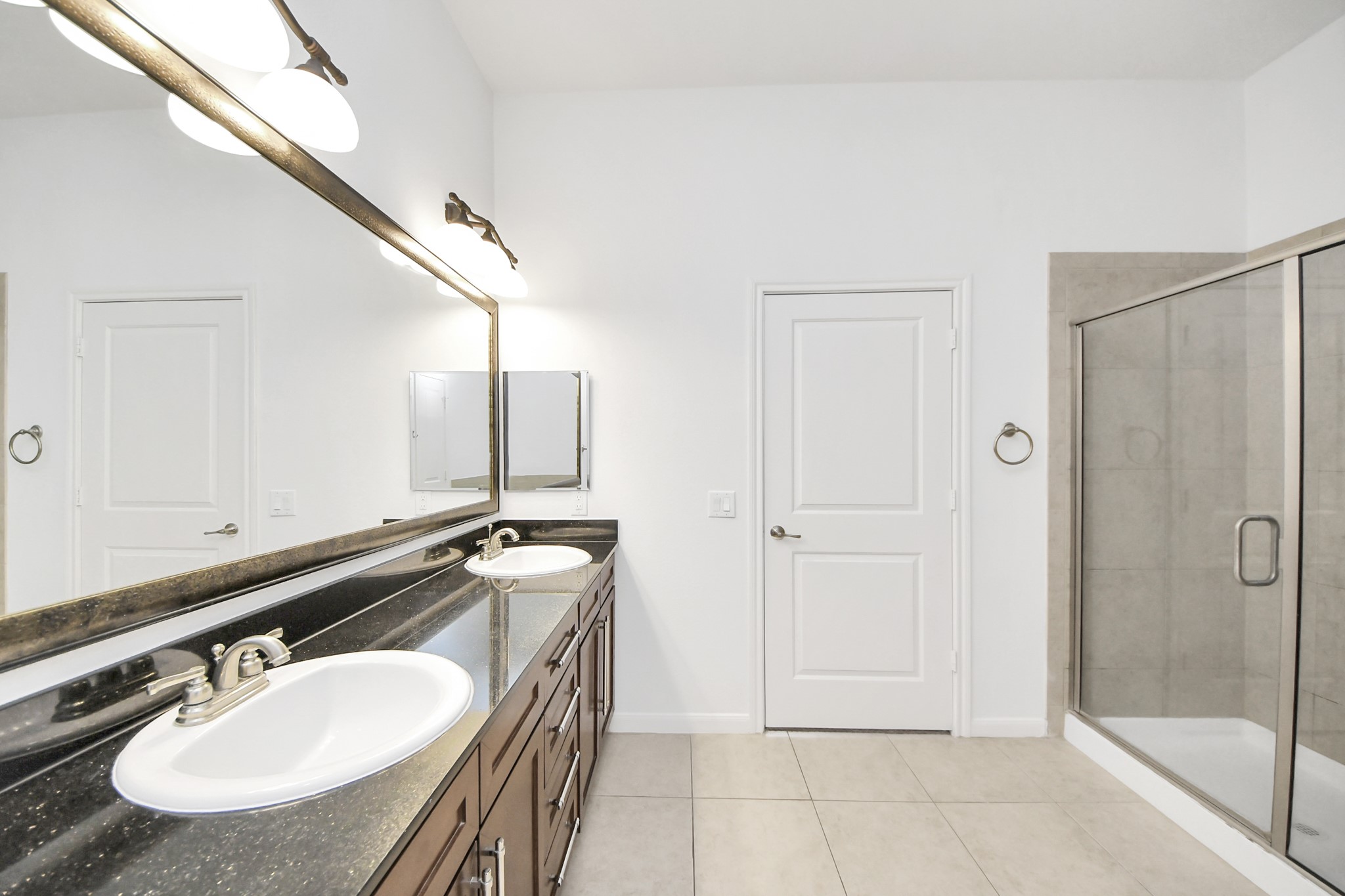 6363 San Felipe Street, Unit 465 Houston, TX 77057 - Photo 18 of 49 a bathroom with a sink and a mirror