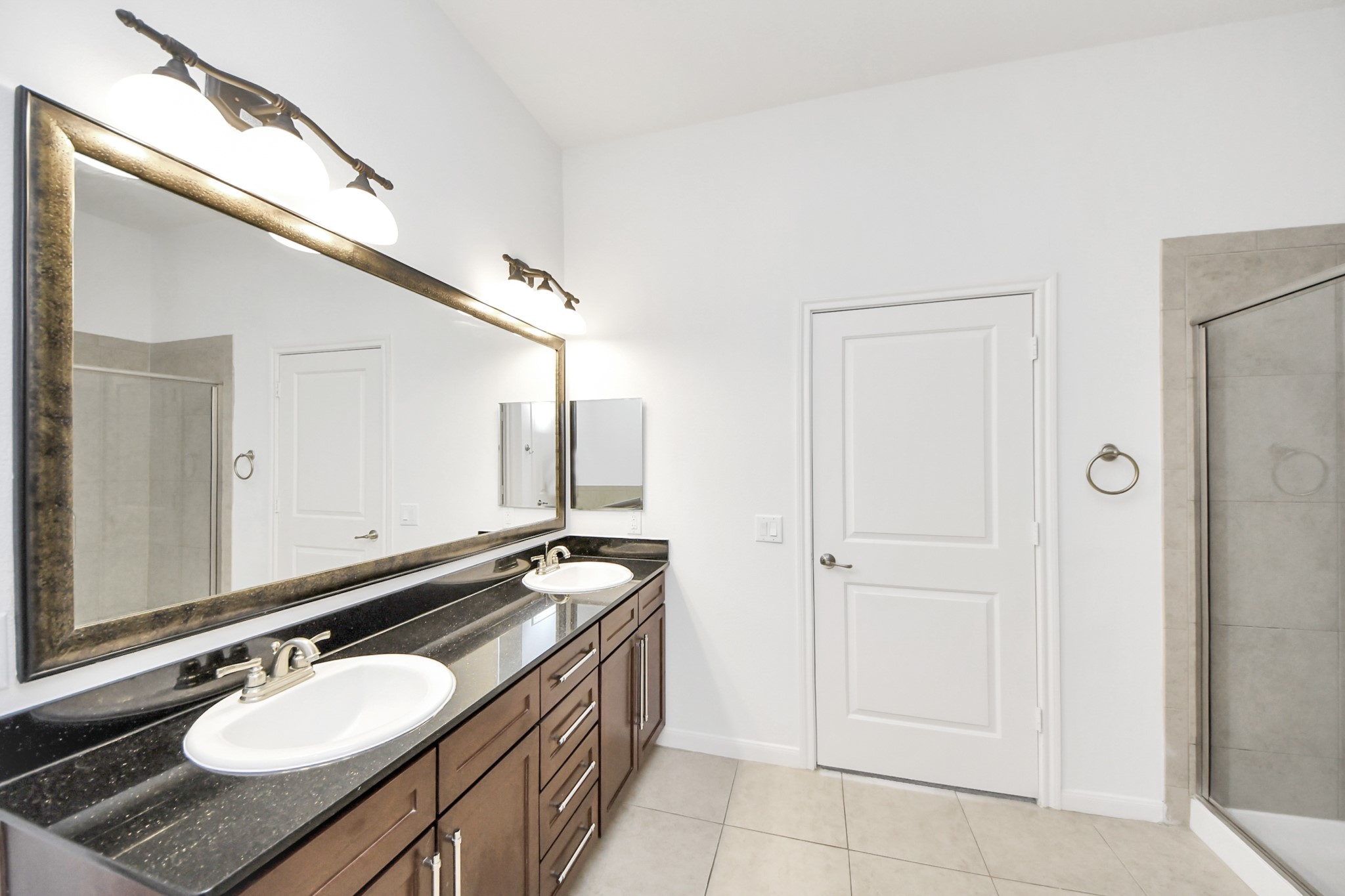 6363 San Felipe Street, Unit 465 Houston, TX 77057 - Photo 19 of 49 a bathroom with a sink and a mirror