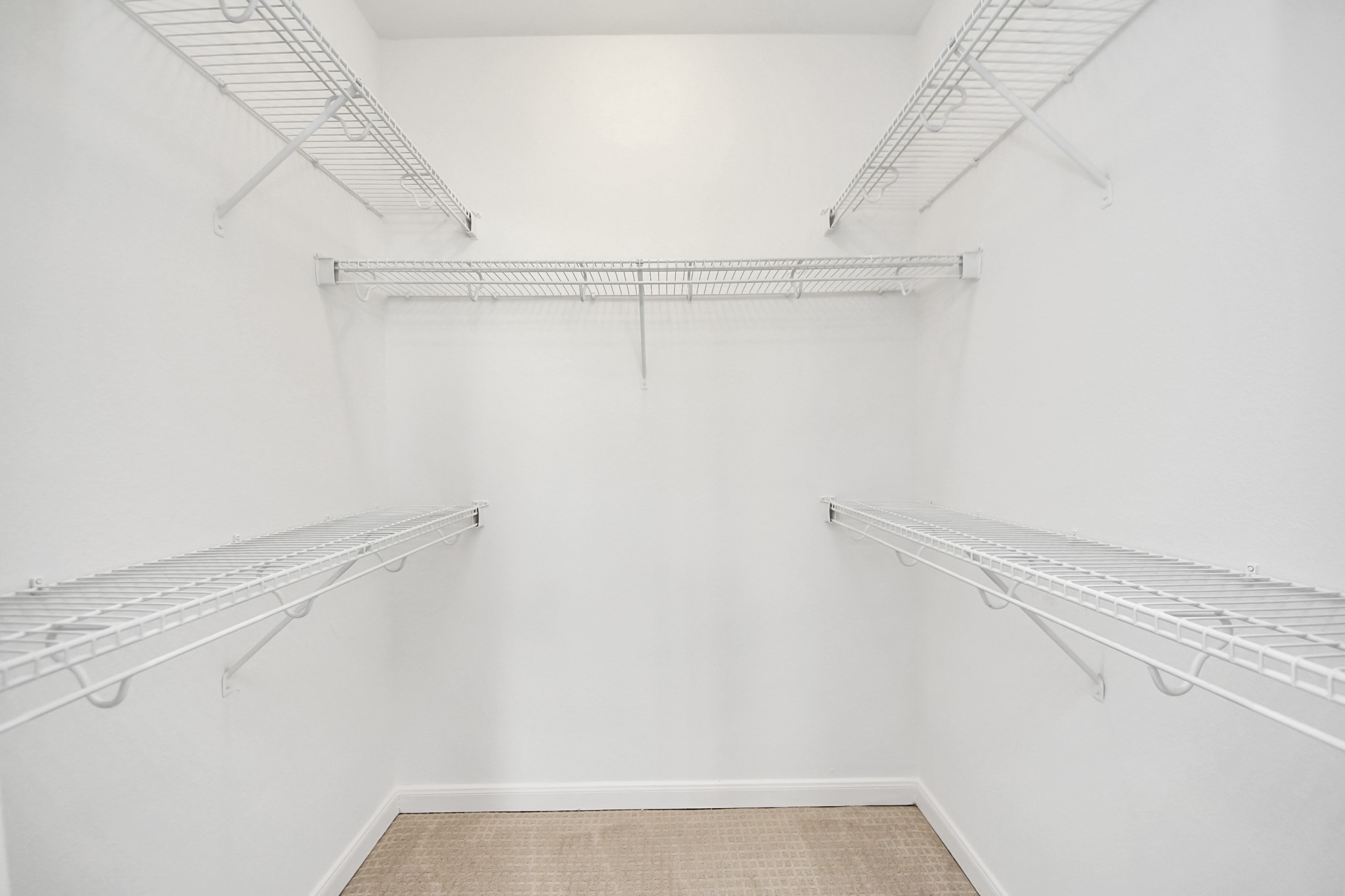6363 San Felipe Street, Unit 465 Houston, TX 77057 - Photo 27 of 49 a view of small space with racks on the wall