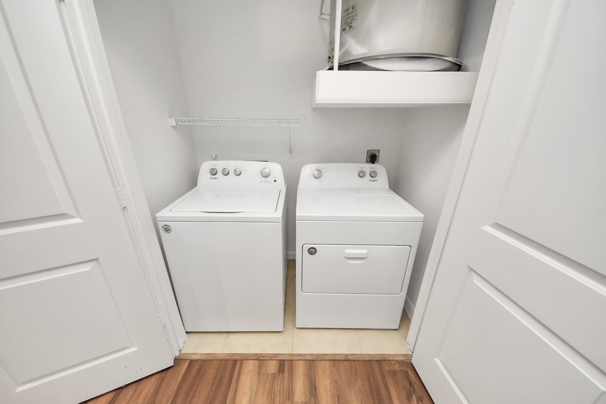 6363 San Felipe Street, Unit 465 Houston, TX 77057 - Photo 31 of 49 a utility room with dryer and washer