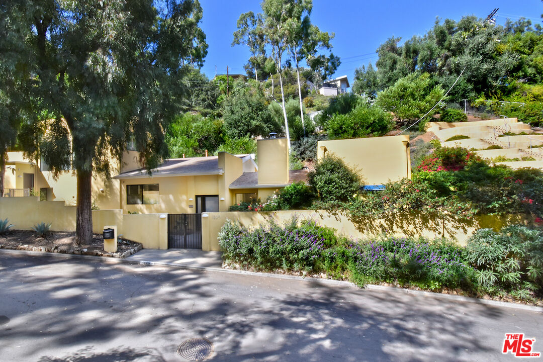 1225 Rancheros Road Pasadena, CA 91103 - Photo 1 of 1 front view of a house with a street