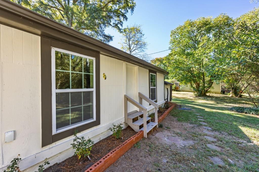 24 East Iron Belt Road Southeast Cartersville, GA 30120 - Photo 35 of 39 a backyard of a house with lots of green space