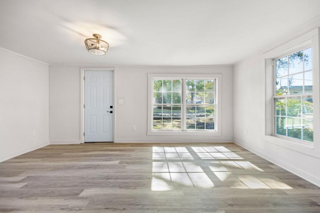 24 East Iron Belt Road Southeast Cartersville, GA 30120 - Photo 9 of 39 a view of an empty room with a window