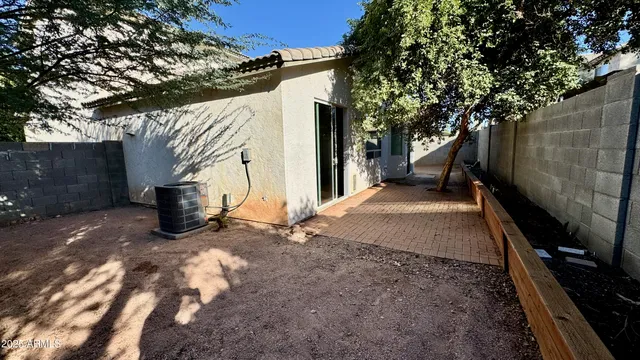 a view of a backyard with a barn