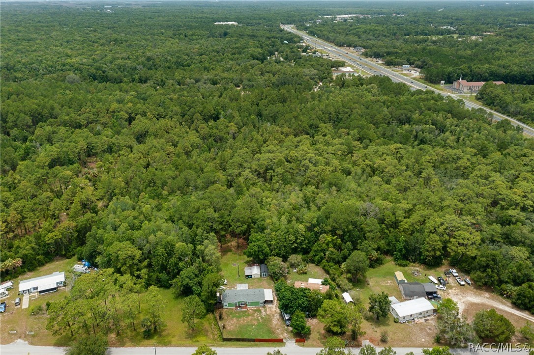 7927 West Cyprian Court Homosassa, FL 34448 - Photo 40 of 40 an aerial view of residential houses with outdoor space and trees
