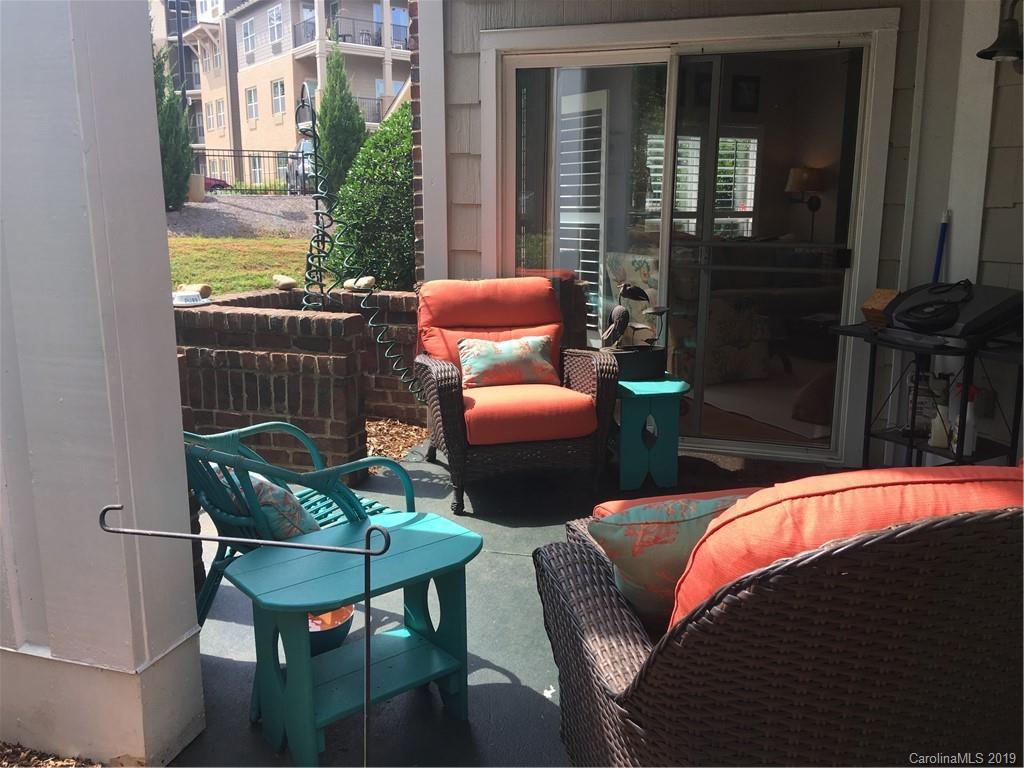 779 Peninsula Drive Davidson, NC 28036 - Photo 25 of 31 a outdoor living space with furniture and a potted plant