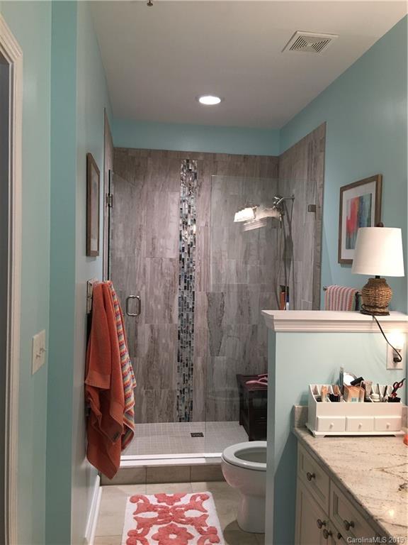 779 Peninsula Drive Davidson, NC 28036 - Photo 5 of 31 a bathroom with a sink toilet and shower