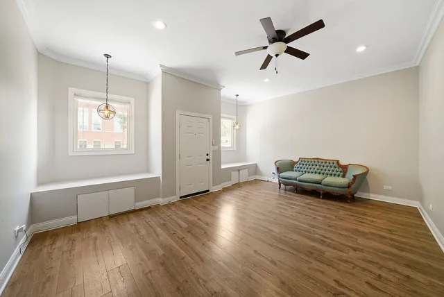 a room with furniture and wooden floor