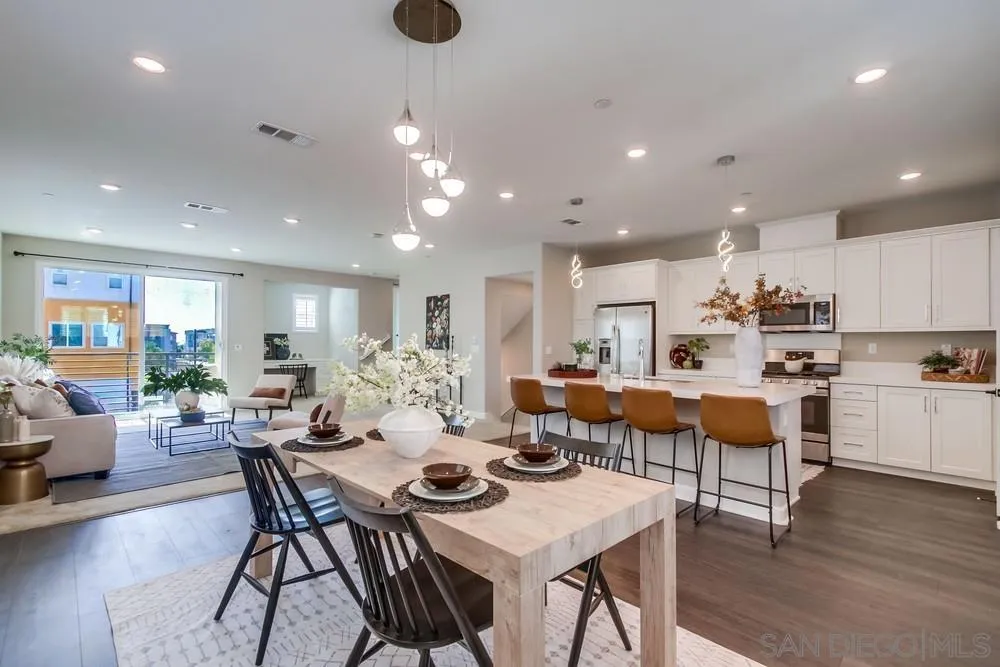 1956 Infinity Lane Chula Vista, CA 91915 - Photo 1 of 58 a view of a dining area with furniture