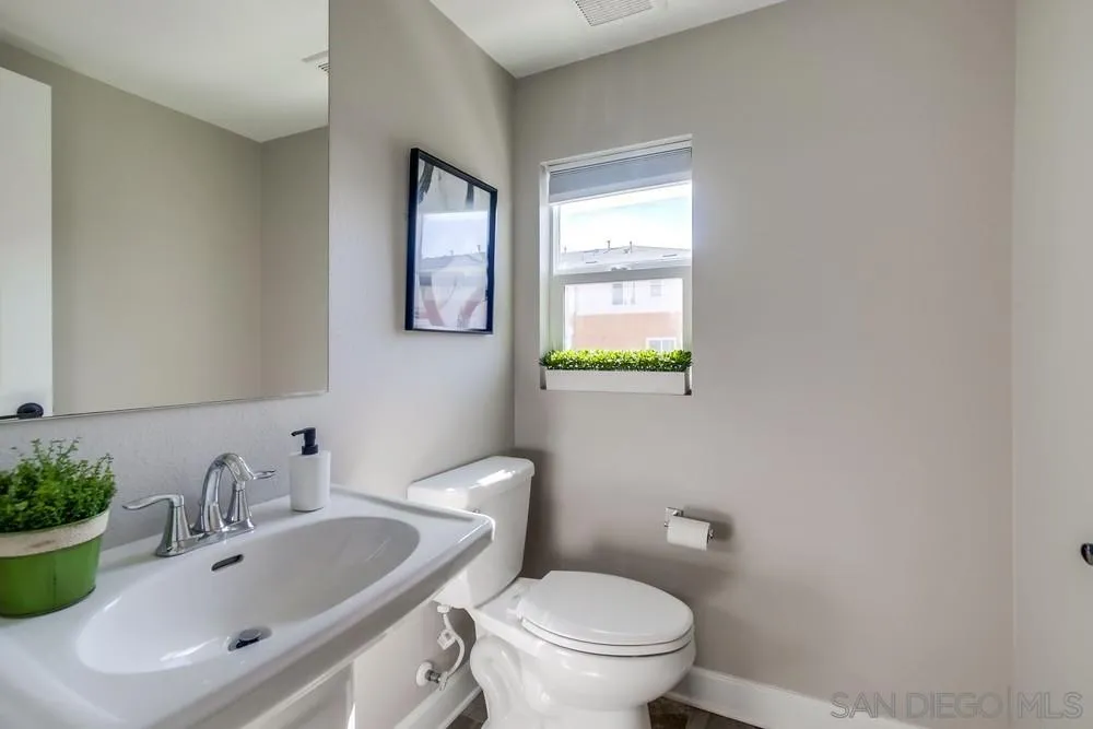 1956 Infinity Lane Chula Vista, CA 91915 - Photo 20 of 58 a bathroom with a sink and a toilet