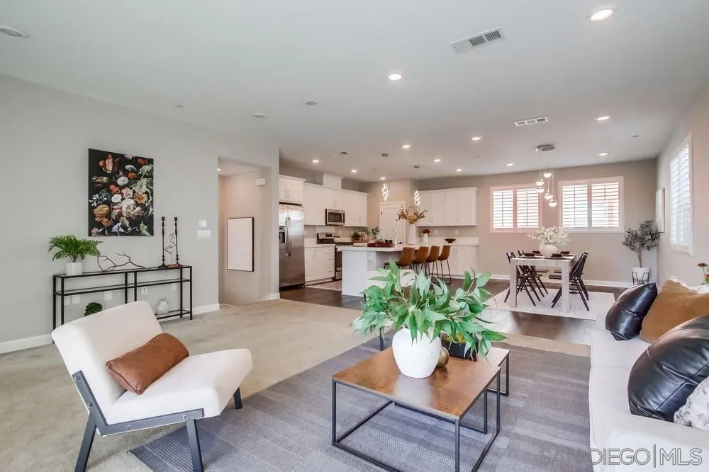 1956 Infinity Lane Chula Vista, CA 91915 - Photo 2 of 58 a living room with furniture kitchen and a table