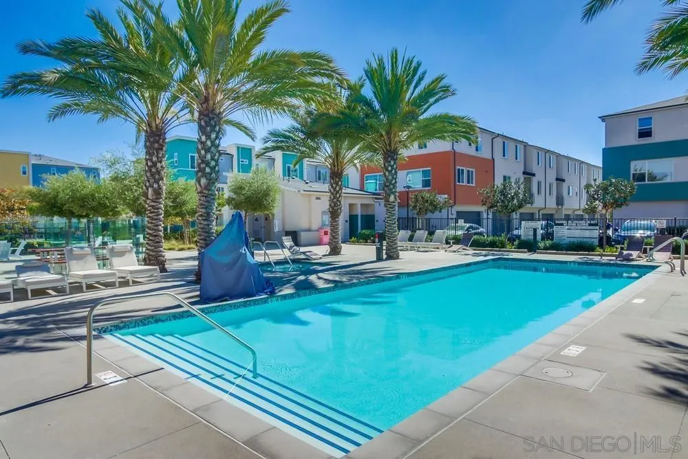1956 Infinity Lane Chula Vista, CA 91915 - Photo 27 of 58 a swimming pool with outdoor seating and yard
