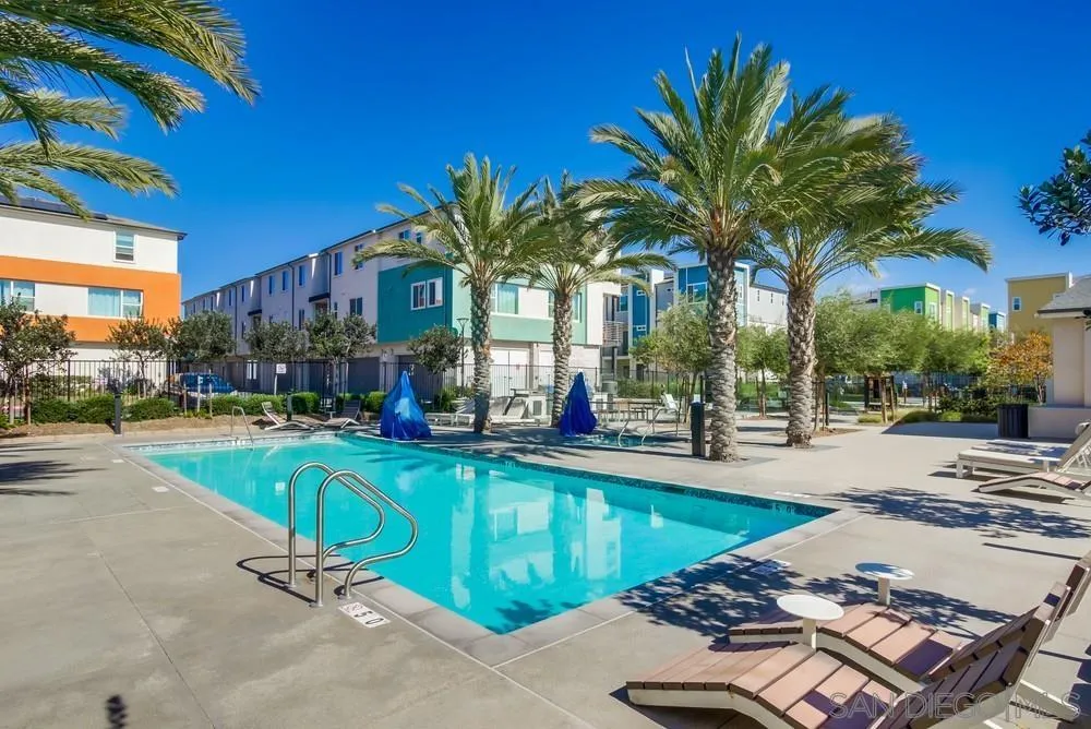 1956 Infinity Lane Chula Vista, CA 91915 - Photo 29 of 58 a swimming pool with outdoor seating and yard
