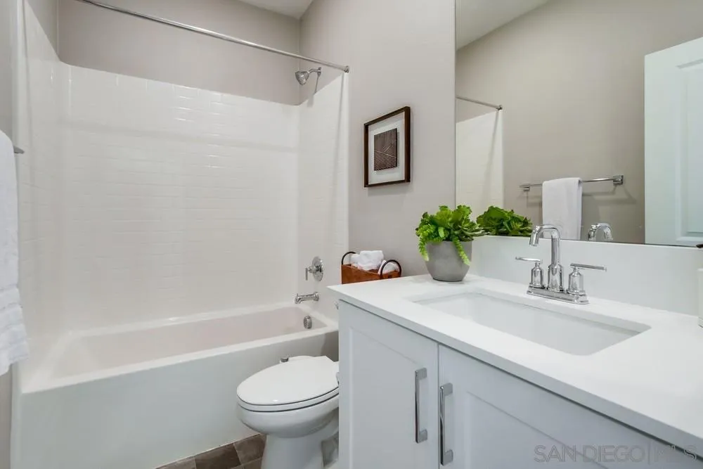 1956 Infinity Lane Chula Vista, CA 91915 - Photo 42 of 58 a bathroom with a sink toilet and shower