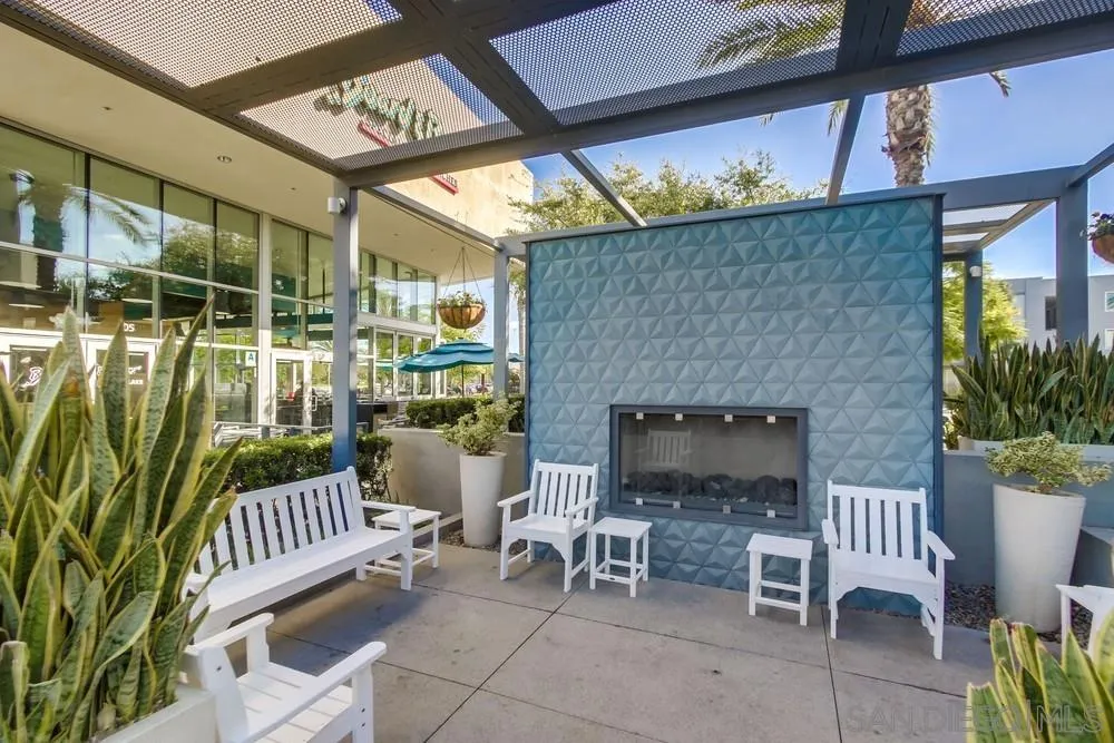 1956 Infinity Lane Chula Vista, CA 91915 - Photo 48 of 58 a balcony with furniture and a potted plant