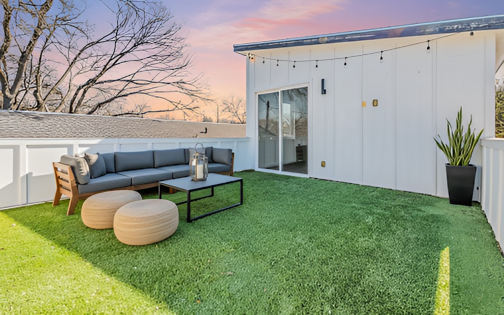 1130 Spur Street, Unit A Austin, TX 78721 - Photo 12 of 31 Terrace showcasing an outdoor hangout area and patio (virtually staged)
