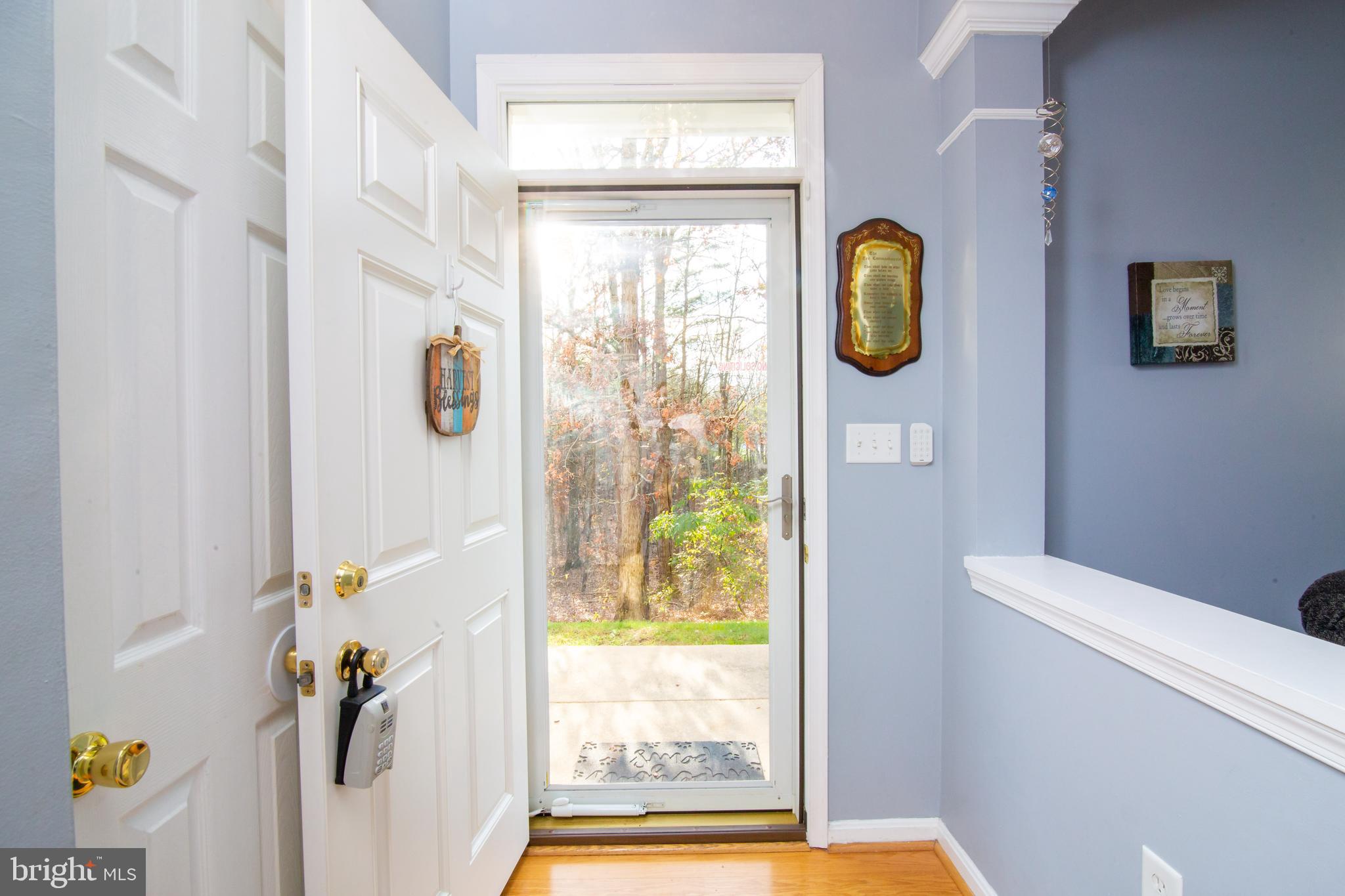 8747 Spring Brook Way Odenton, MD 21113 - Photo 40 of 46 Front entrance with wooded, private views