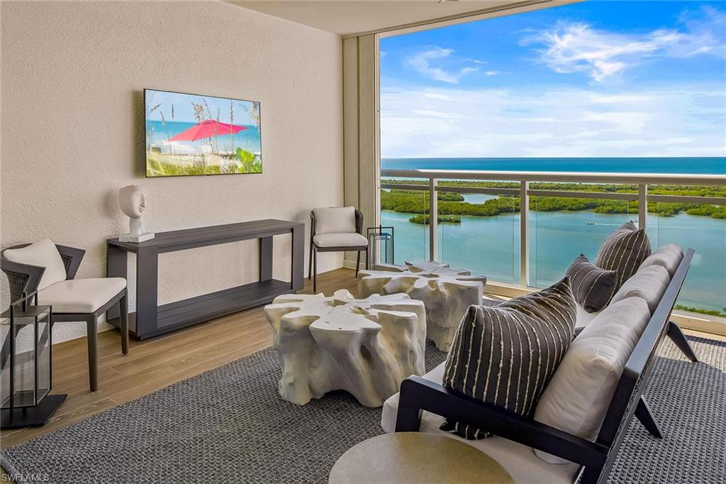13935 Old Coast Road, Unit 2206 Naples, FL 34110 - Photo 7 of 50 Relax, entertain, and watch TV amid a truly majestic backdrop, creating an ever-changing coastal backdrop for outdoor living