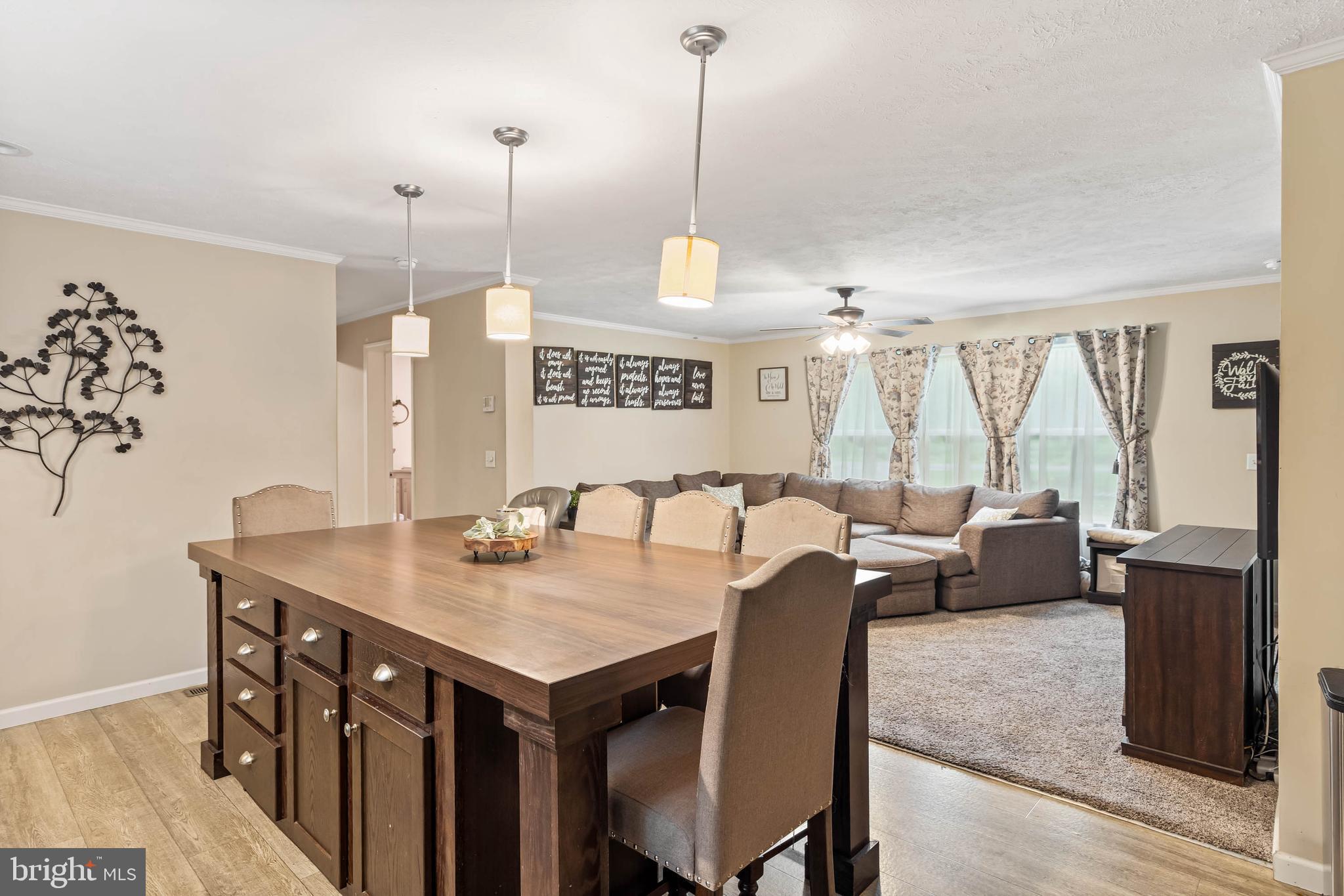 24335 Shortly Road Georgetown, DE 19947 - Photo 13 of 29 a view of a dining room and furniture