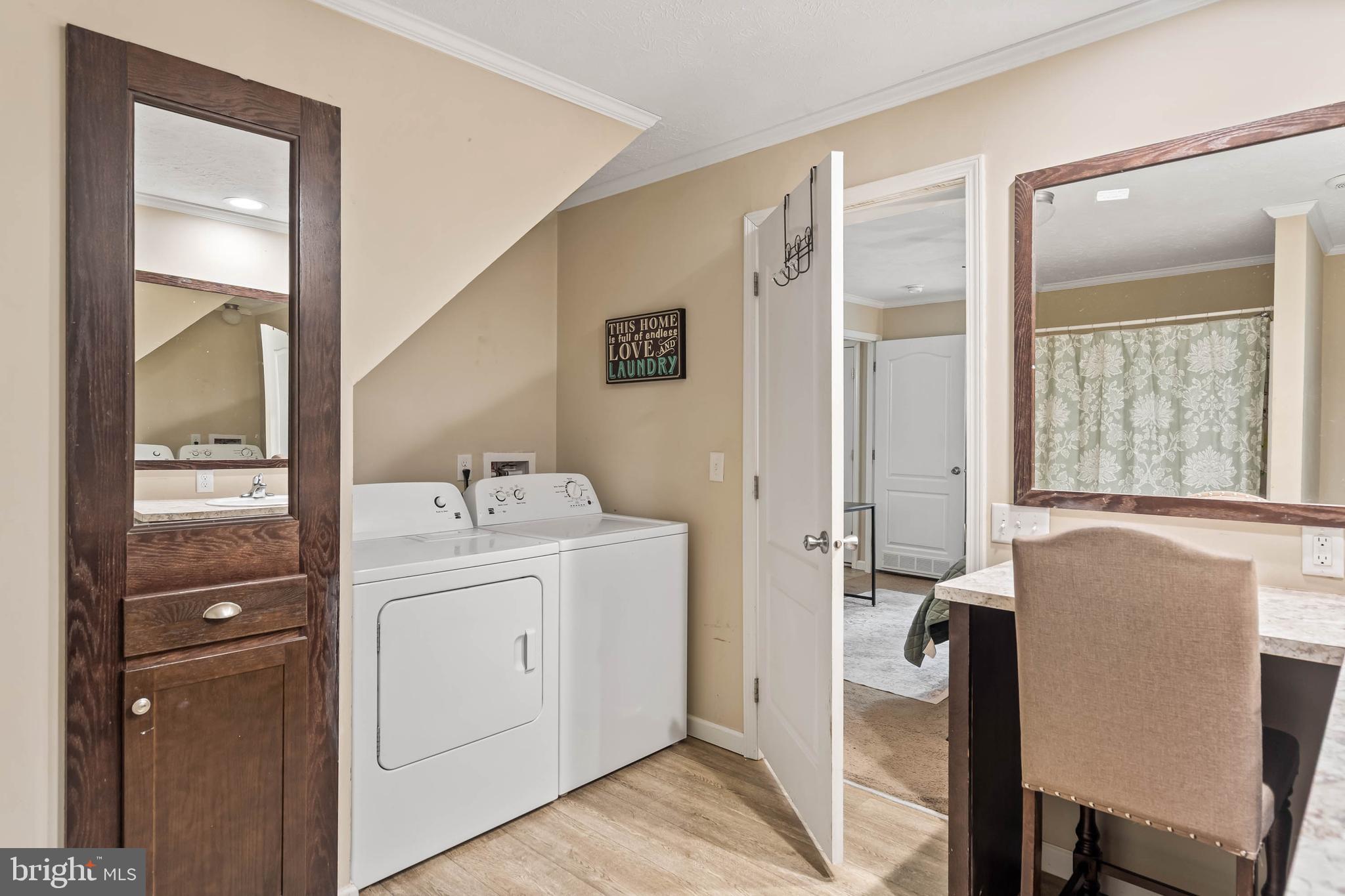 24335 Shortly Road Georgetown, DE 19947 - Photo 19 of 29 a view of a bathroom with a sink and mirror