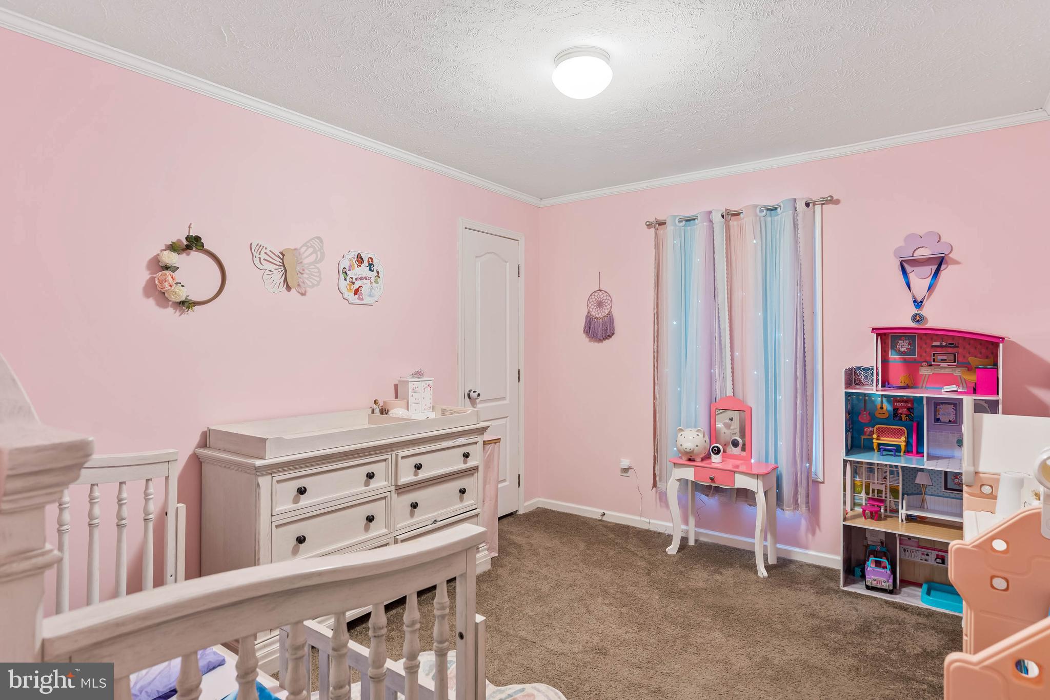 24335 Shortly Road Georgetown, DE 19947 - Photo 20 of 29 a bedroom with furniture and a book shelf