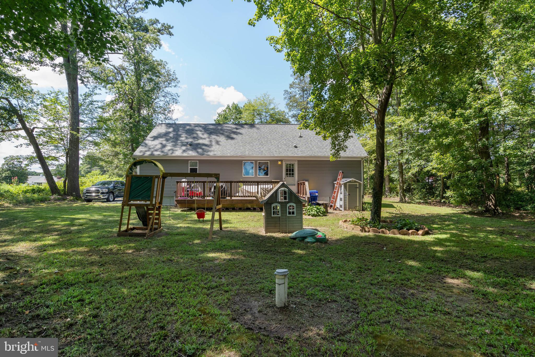 24335 Shortly Road Georgetown, DE 19947 - Photo 29 of 29 a view of a house with pool and a yard