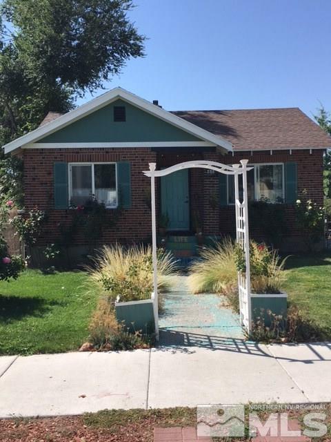 612 Cheney Street Reno, NV 89502 - Photo 1 of 1 a front view of a house with garden
