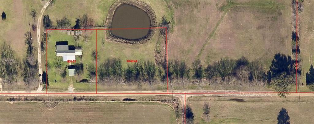 a bathroom with a bathtub and a mirror