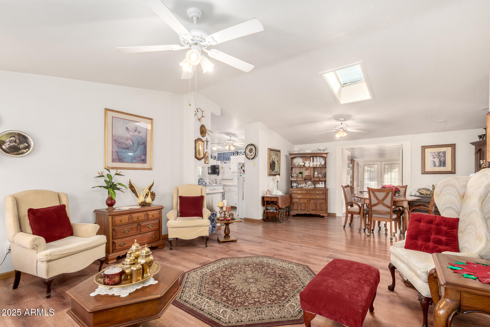 2400 East Baseline Avenue, Unit 148 Apache Junction, AZ 85119 - Photo 11 of 42 a living room with furniture and wooden floor