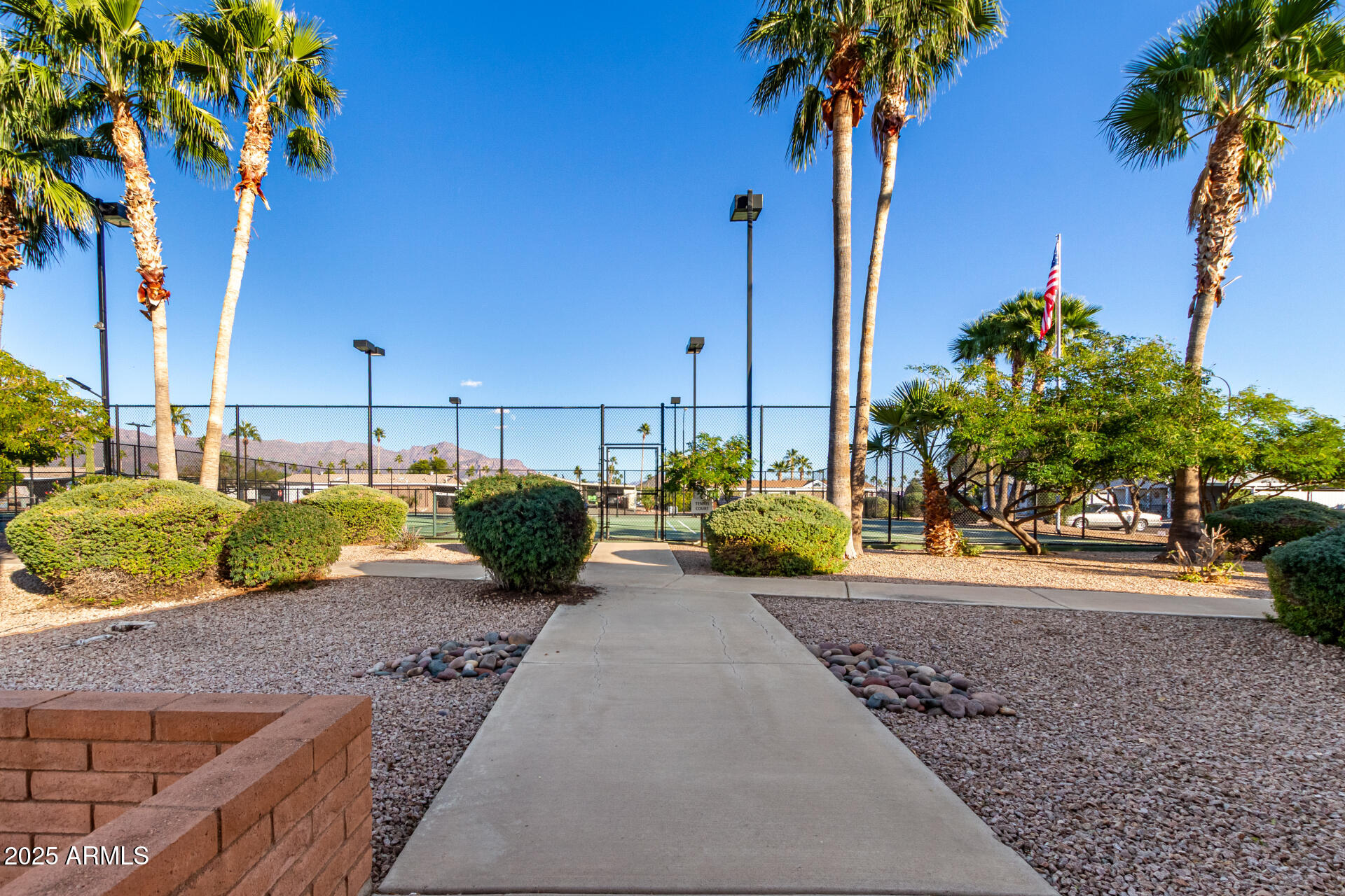 2400 East Baseline Avenue, Unit 148 Apache Junction, AZ 85119 - Photo 37 of 42 a view of a street with some trees