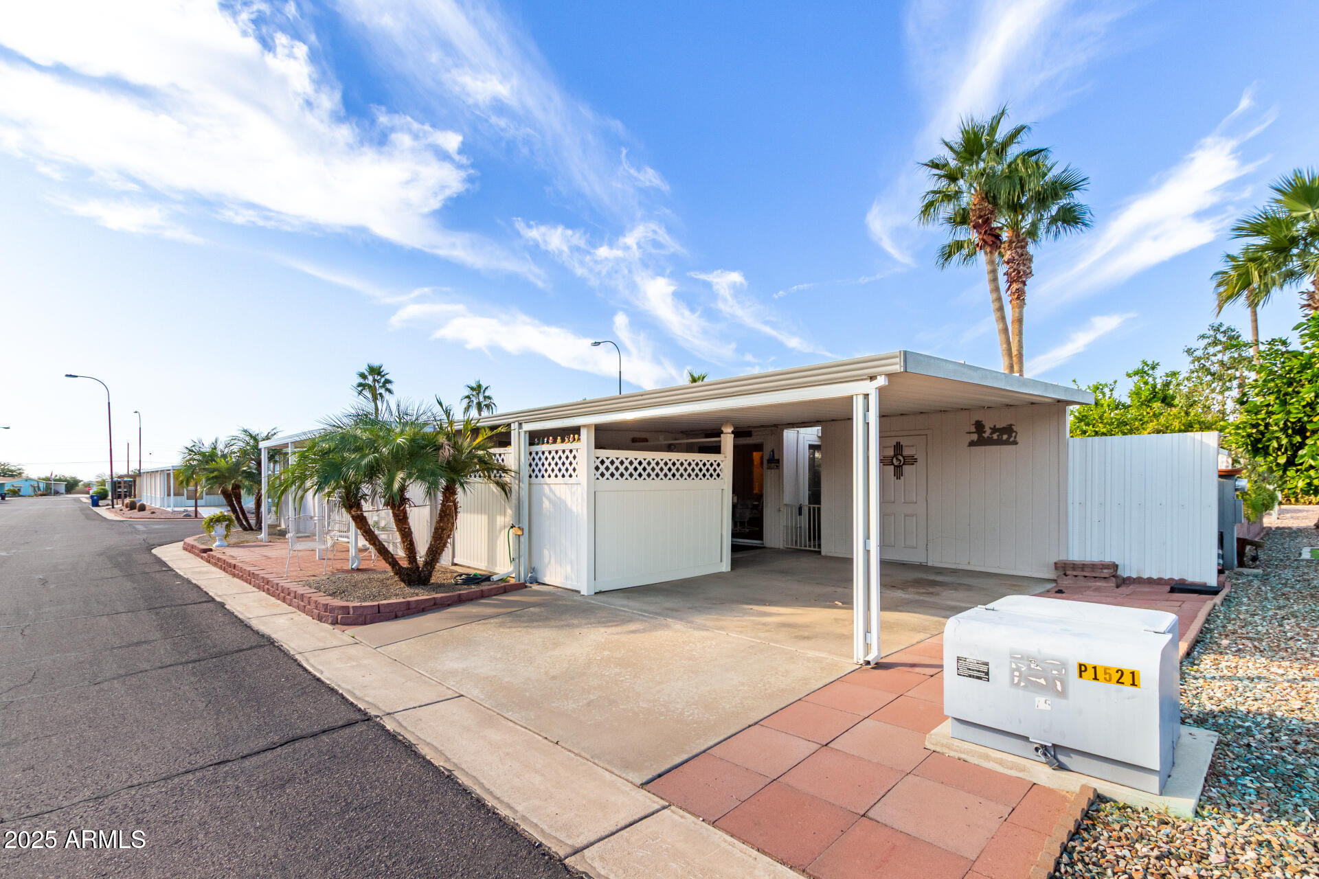 2400 East Baseline Avenue, Unit 148 Apache Junction, AZ 85119 - Photo 4 of 42 a view of a entryway door of the house