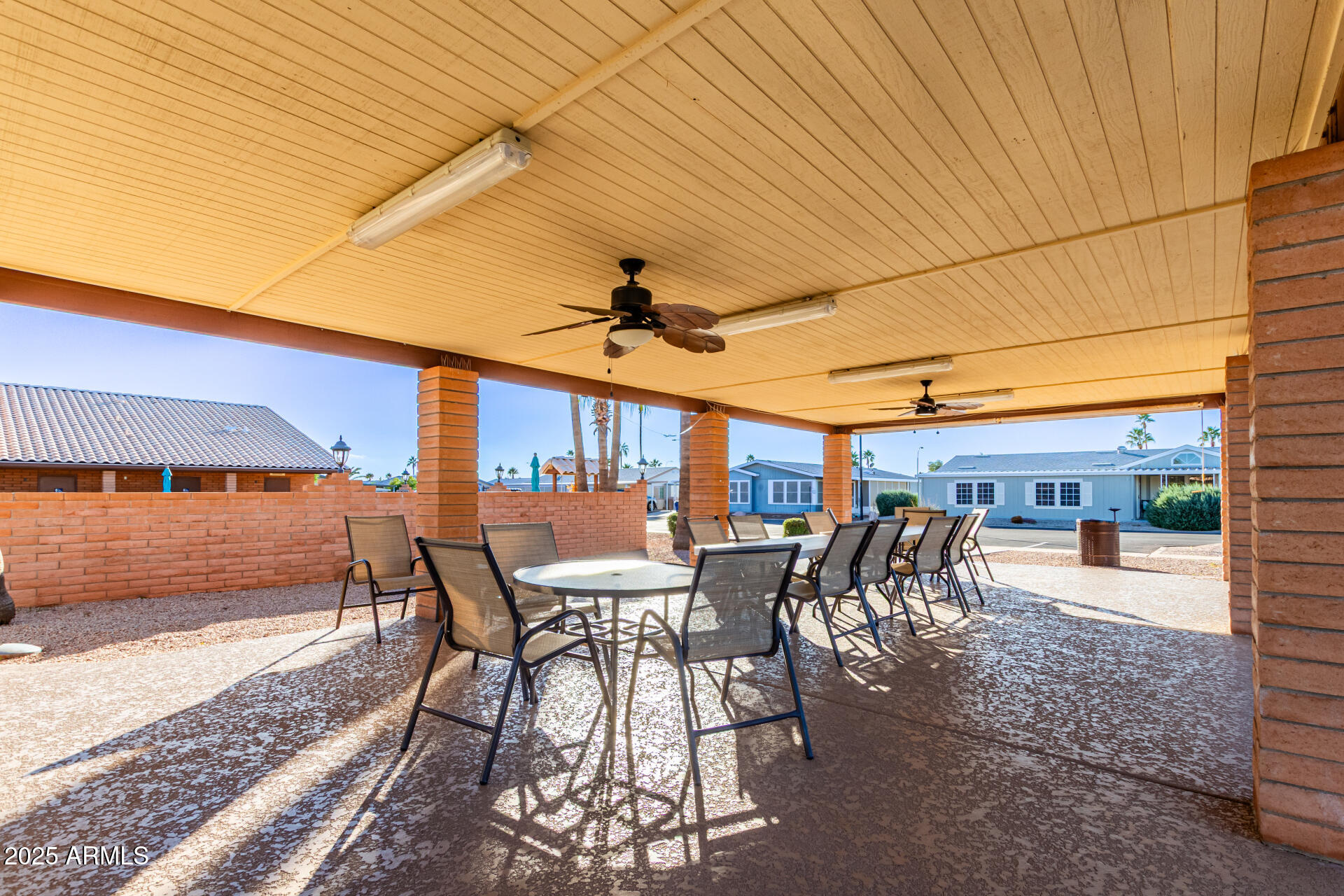 2400 East Baseline Avenue, Unit 148 Apache Junction, AZ 85119 - Photo 41 of 42 a outdoor space with lots of tables and chairs